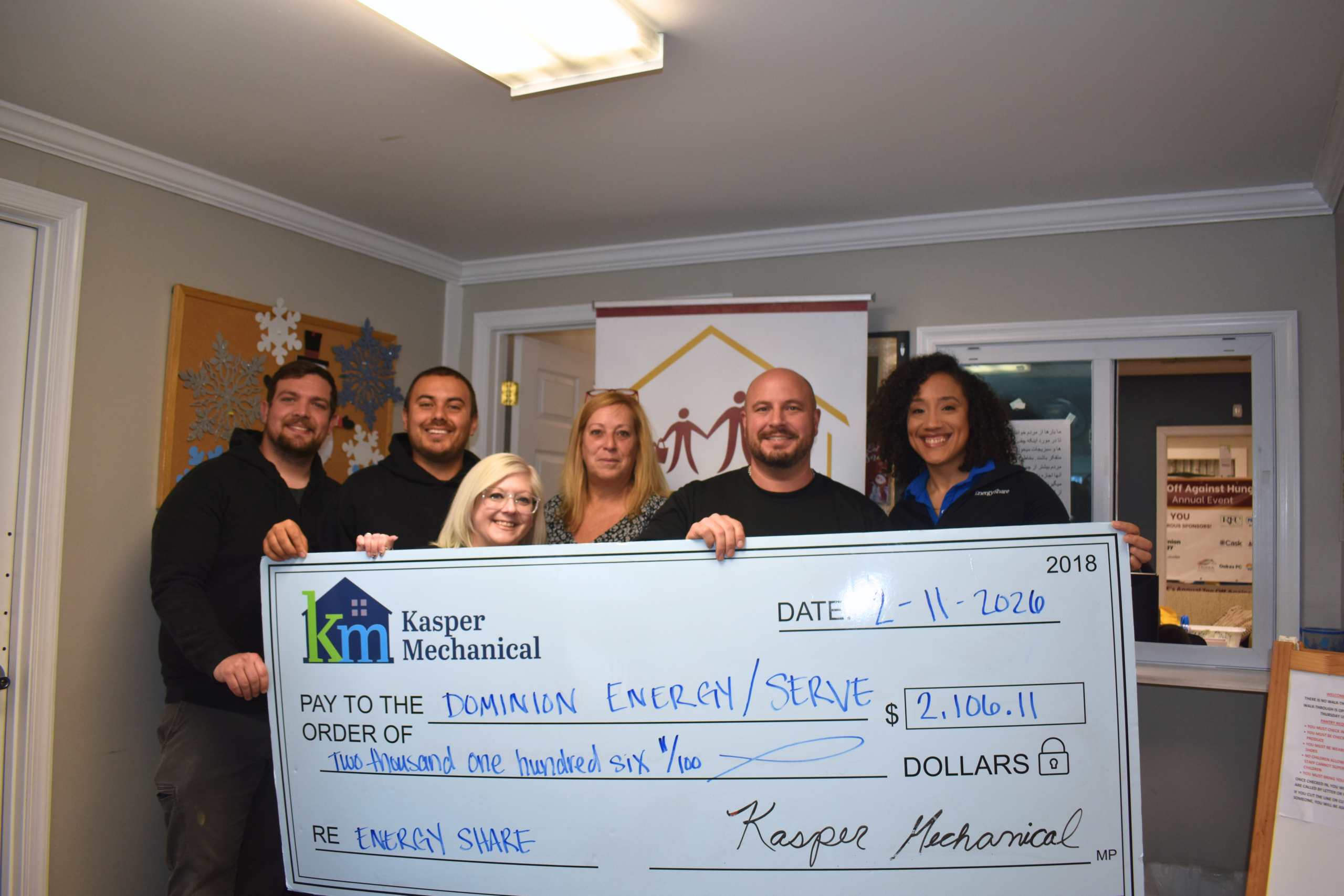 Kasper Mechanical Presents Check to SERVE and Dominion Energy Kasper Mechanical presents check to a local charity.