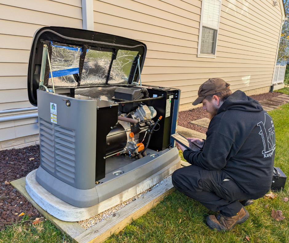 A technician repairing a generator.