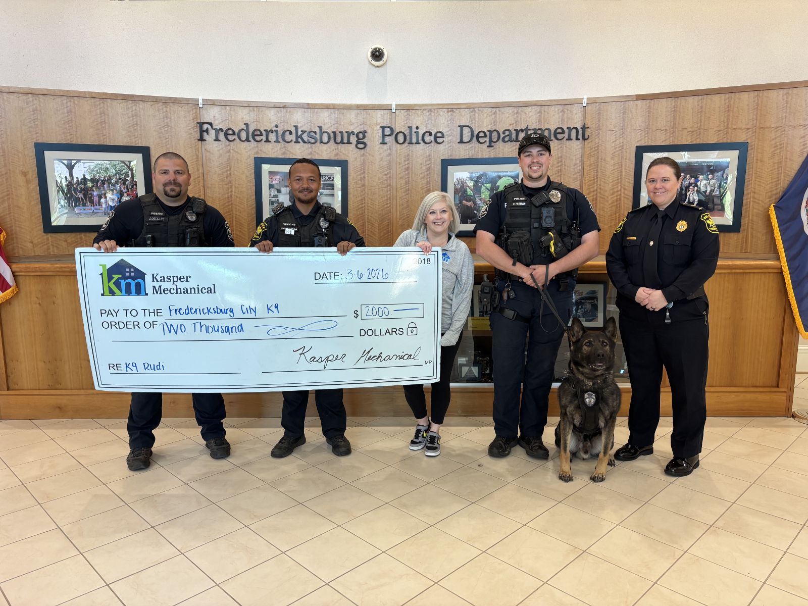 Left to right: Joel Decilles, Uyurre Brown-Kaleopaa, Samantha Fredo, Officer Chrisopher Froman, Chief Besty Mason